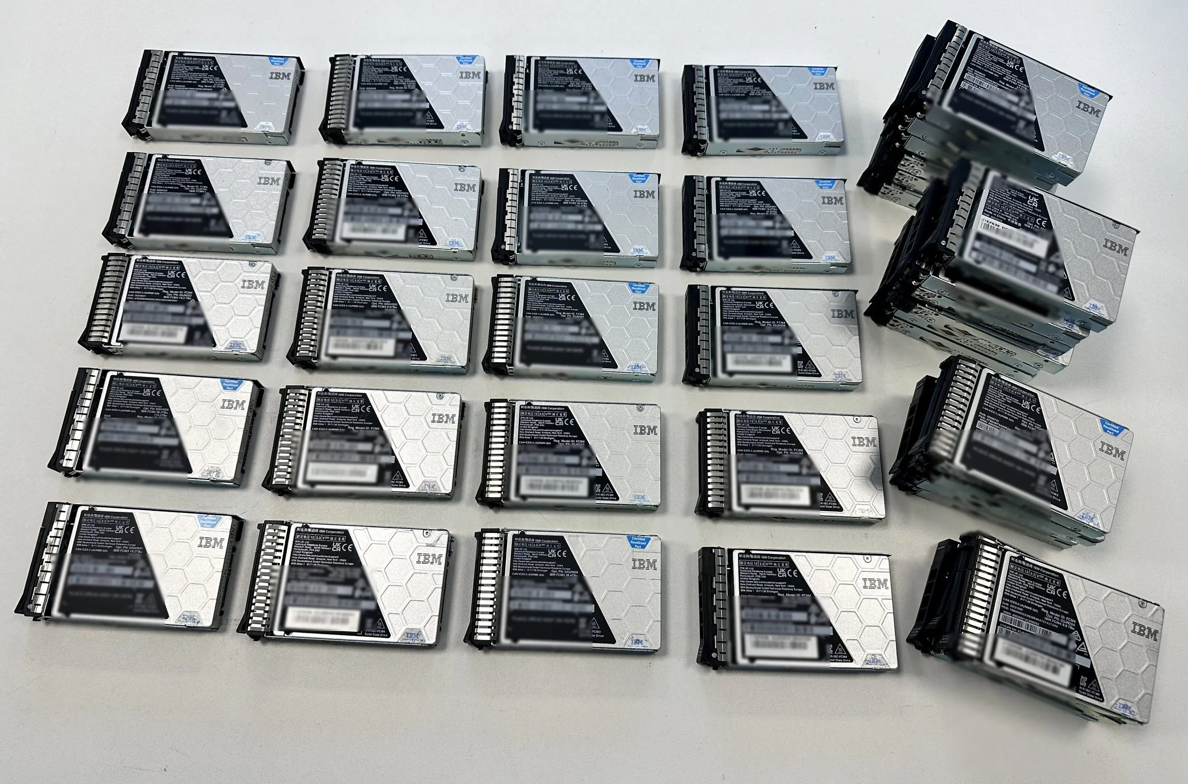 A pile of IBM FlashCore Modules on our intake bench